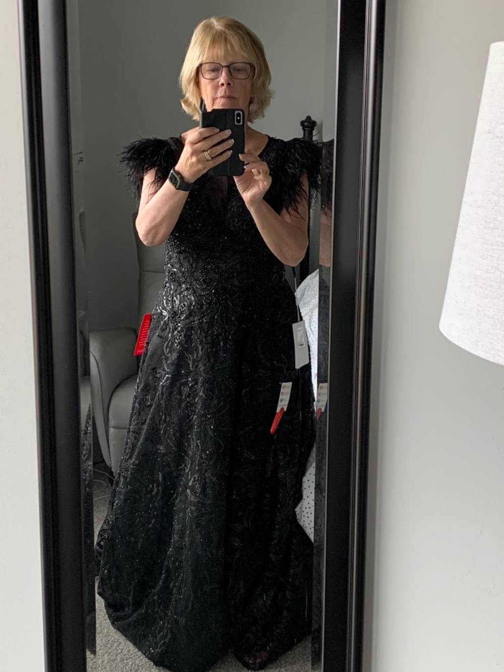 Mac Douggal feather trimmed a line gown
